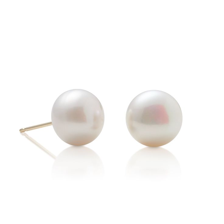 Simple statements of elegance, pearls have been a mainstay in Gump's fine jewelry assortment for decades. Revered for their alluring luster and classic beauty, they are widely recognized as symbols of purity, integrity and wisdom gained through experience. To create these earrings, each pearl is carefully selected for quality, color and shape. Freshwater cultured button pearls, 10mm. 14-karat yellow gold. Pierced only. Timeless Pearl Earrings As Gift, Elegant White Pearl Earrings With Pearl Buttons, Classic Pearl White Jewelry With Pearl Buttons, Classic Round Pearl Earrings, Refined Round Pearl Earrings As Gift, Refined Round Pearl Earrings For Gift, Classic Yellow Gold Bridal Earrings, Classic Pearl Earrings With High Luster, Classic Round Pearl Drop Earrings