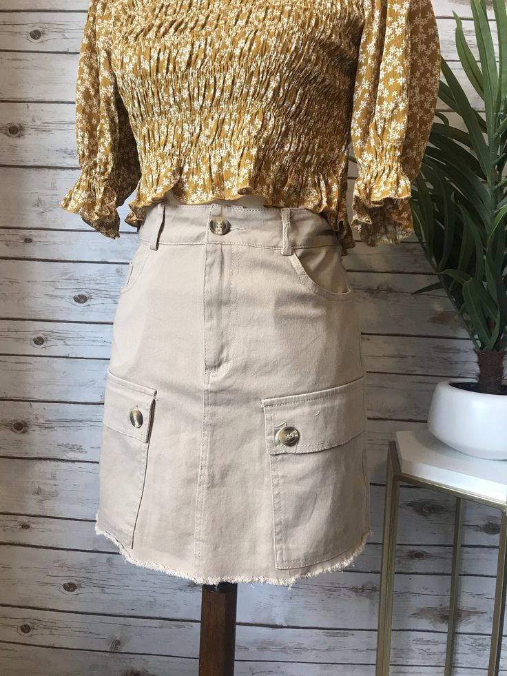 "Waist :  S: 27\" M: 28\"  L: 29\" Hips: S: 33\" M: 34\" L: 36\" Length: S: 14\" M: 14.5\" L: 15\" Khaki cargo skirt with buttons.   Shirt not included. Skirt only." Womens Overalls, Skirt With Buttons, Animal Print Skirt, Cargo Skirt, White Floral Dress, Overalls Women, Satin Skirt, Flowy Tops, Lovely Dresses