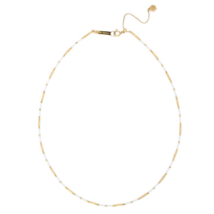 Indulge in the exquisite craftsmanship of our Handmade 18K Tube Beading Ceramic Chain. This one-of-a-kind necklace is made with 18K gold and features a unique ceramic chain. With a length of 16-18" and our signature silicon slide extender, this piece will elevate any outfit. Luxury White Chain Necklace With Adjustable Chain, White Pearl Chain Necklace With Round Beads, White Luxury Necklace With Delicate Chain, Luxury White Necklace With Delicate Chain, White Delicate Chain Necklace In Gold Plated, Luxury Long Beaded Chain Necklace, Luxury Beaded Long Necklace, Luxury White Chain Necklace As Gift, Luxury White Chain Necklace For Gift