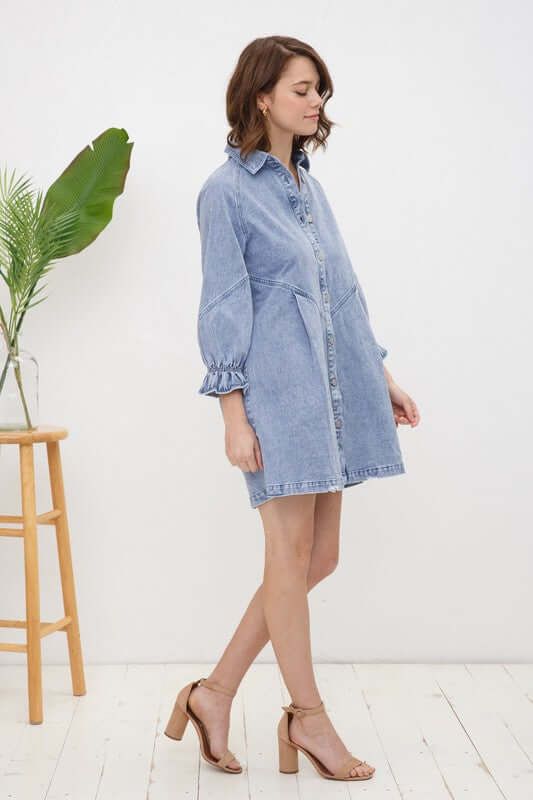 The Washed Denim Mini Dress is a classic and effortlessly stylish piece that belongs in every fashion-savvy closet. Its timeless denim fabric and casual yet elegant design make it a go-to choice for various occasions, from a relaxed day out to a casual evening gathering. This dress offers a comfortable and chic option for those seeking a blend of comfort and fashion in one piece. Style: Casual Fit: Loose Embellishment: Puff Sleeve Neckline: Collar Sleeve: Long Sleeve Length: Short Closure: Butto Chic Relaxed Fit Button-up Denim Dress, Long-sleeve Denim Dress For Casual Spring Wear, Long Sleeve Denim Dress For Casual Spring Wear, Long Sleeve Denim Dress For Casual Spring Days, Spring Long Sleeve Washed Denim Dress, Long Sleeve Denim Dress For Dress Down And Spring, Chic Washed Long Sleeve Denim Dress, Casual Cotton Denim Dress With Pockets, Chic Light Wash Mini Denim Dress