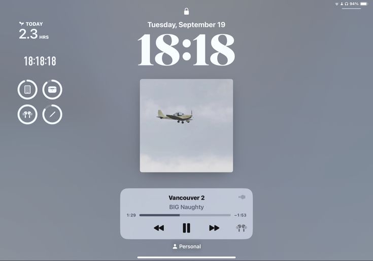 an airplane is flying in the sky on a gray and white background with text below it