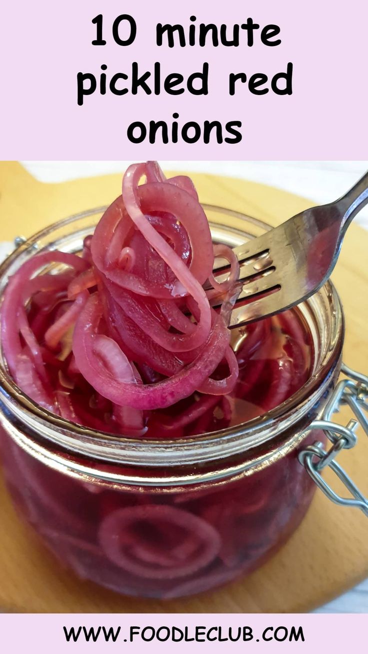 pickled red onions in a jar with a fork and text overlay that reads 10 minute pickled red onions