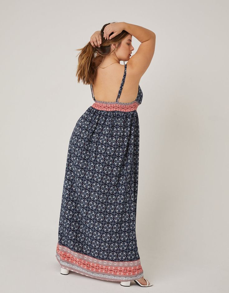 A 00s boho throwback, the Curve Abstract Printed Maxi Dress is quickly becoming a classic. This dress features adjustable double spaghetti straps, a deep v-shaped neckline, a smocked upper back, and a flowy silhouette. The material is a non-stretchy woven. This dress is made from 100% rayon. Hand wash cold. Imported. Model is wearing a size 1XL. Bohemian Backless Maxi Dress With Adjustable Straps, Summer V-neck Sundress With Smocked Back, Bohemian Backless Maxi Dress With Smocked Back, Casual Maxi Dress With Smocked Back And Spaghetti Straps, Bohemian Maxi Dress With Smocked Back For Summer, Bohemian Midi Sundress With Adjustable Straps, Bohemian Flowy Maxi Dress With Adjustable Straps, Casual Maxi Dress With Spaghetti Straps And Smocked Back, Blue Bohemian Sundress With Adjustable Straps