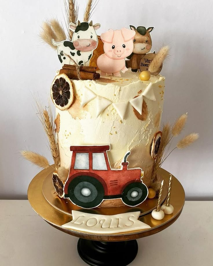 a cake decorated with farm animals on top of it