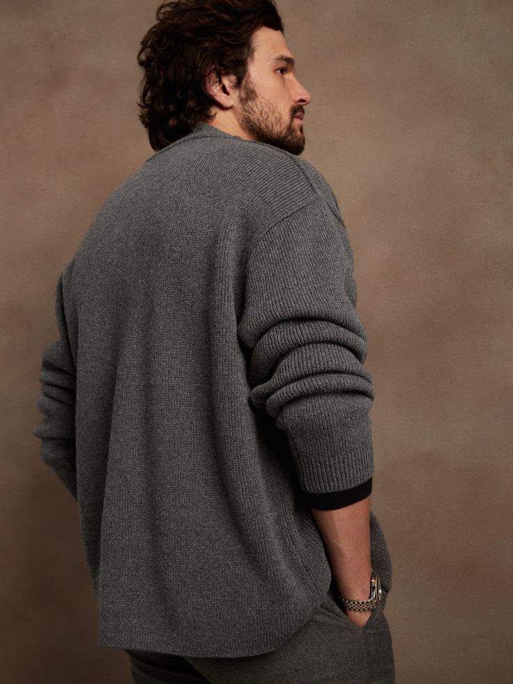 Made from a blend of extra fine Merino wool, this soft and warm cardigan is knitted in a subtly textured half-Milano stitch, which adds soft structure for refined appeal.  OVERSIZED FIT: Relaxed, boxy fit with a dropped shoulder.  Standard fit.  Long Wool V-neck Cardigan For Layering, V-neck Textured Knit Cardigan For Layering, Textured Cashmere Sweater For Layering, Textured Knit Cashmere Sweater For Layering, Cashmere Textured Knit Sweater For Layering, Classic Gray Sweater For Layering, Fine Knit Outerwear For Layering, Solid Fine Knit Outerwear For Layering, Classic V-neck Sweater Coat For Layering