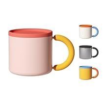 three different colored coffee mugs next to each other on a white background with the same color