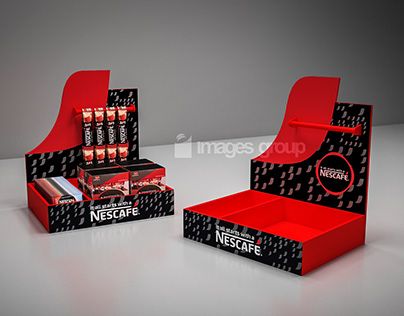 two red and black cardboard boxes with toothpaste in them