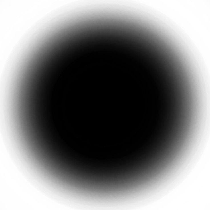 a black and white photo of a circular object