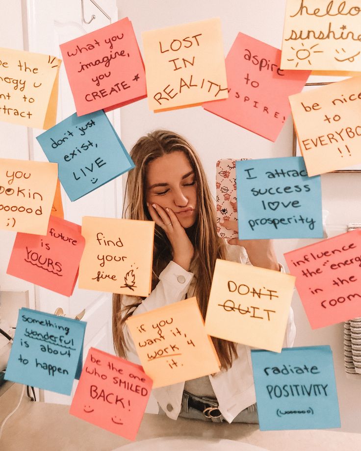 a woman is surrounded by post - it notes that read, i don't want to