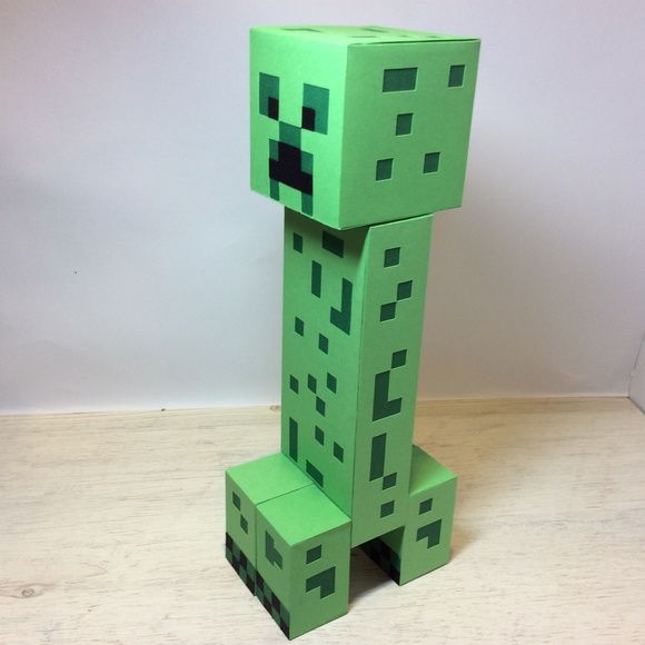 an image of a minecraft creeper made out of paper