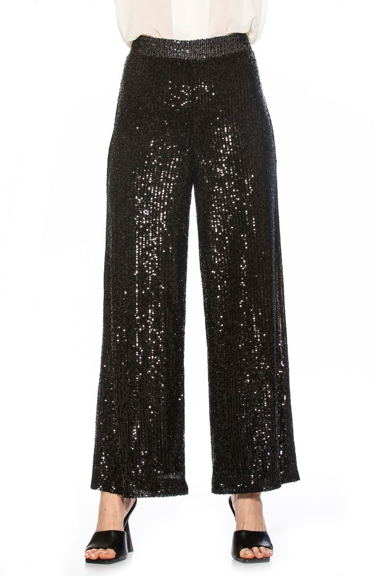 Sparkling sequins bring dazzling allure to a pair of stretch pants that are elevated by a wide leg and mid rise. Banded waist Invisible back zipper 90% polyester, 10% spandex; lining content: 100% polyester Hand wash cold, lay flat to dry Imported Model stats: 5'10", 32" bust, 25" waist, 36" hip. Model is wearing size X-Small. Black Sequin Pants, Sequence Dress, Sequin Pants, Stylish Pants, Confident Woman, Stretch Pants, Wedding Outfits, Holiday Outfits, Latest Styles