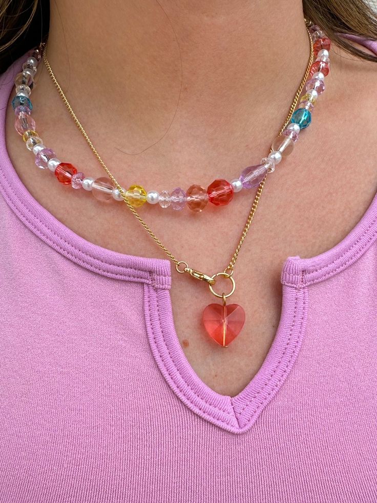 The perfect summer accessory- necklaces with the cutest rainbow beads!! Adds some fun and color to every outfit and is THE necklace of the summer!! Approx. Length 16.5+2" Add another necklace! Fruity Charm Necklace https://www.aspynandivy.com/products/fruit-charm-necklace?_pos=2&_sid=52fe803c9&_ss=r Multicolor Heart-shaped Beaded Chain Necklace, Cute Everyday Necklaces With Colorful Beads, Cute Everyday Beaded Necklaces, Trendy Colorful Jewelry With Heart Beads, Cute Everyday Necklaces With Round Beads, Trendy Charm Necklaces With Colorful Beads, Trendy Heart-shaped Colorful Beads Necklace, Trendy Heart-shaped Beaded Necklace With Colorful Beads, Trendy Heart-shaped Colorful Beaded Necklace