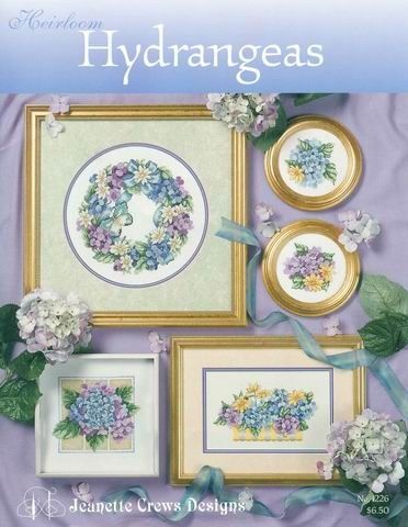 cross stitch pattern book with flowers and frames