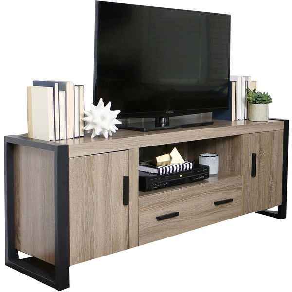 a flat screen tv sitting on top of a wooden entertainment center