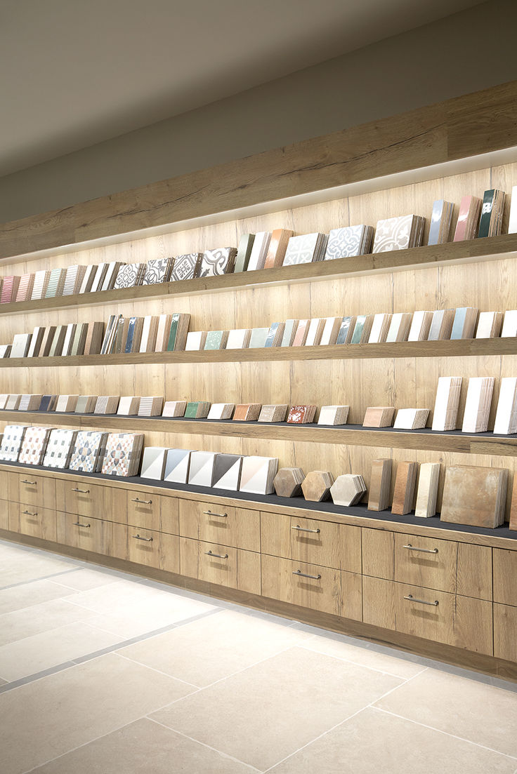 there are many books on the shelves in this room that is full of bookcases