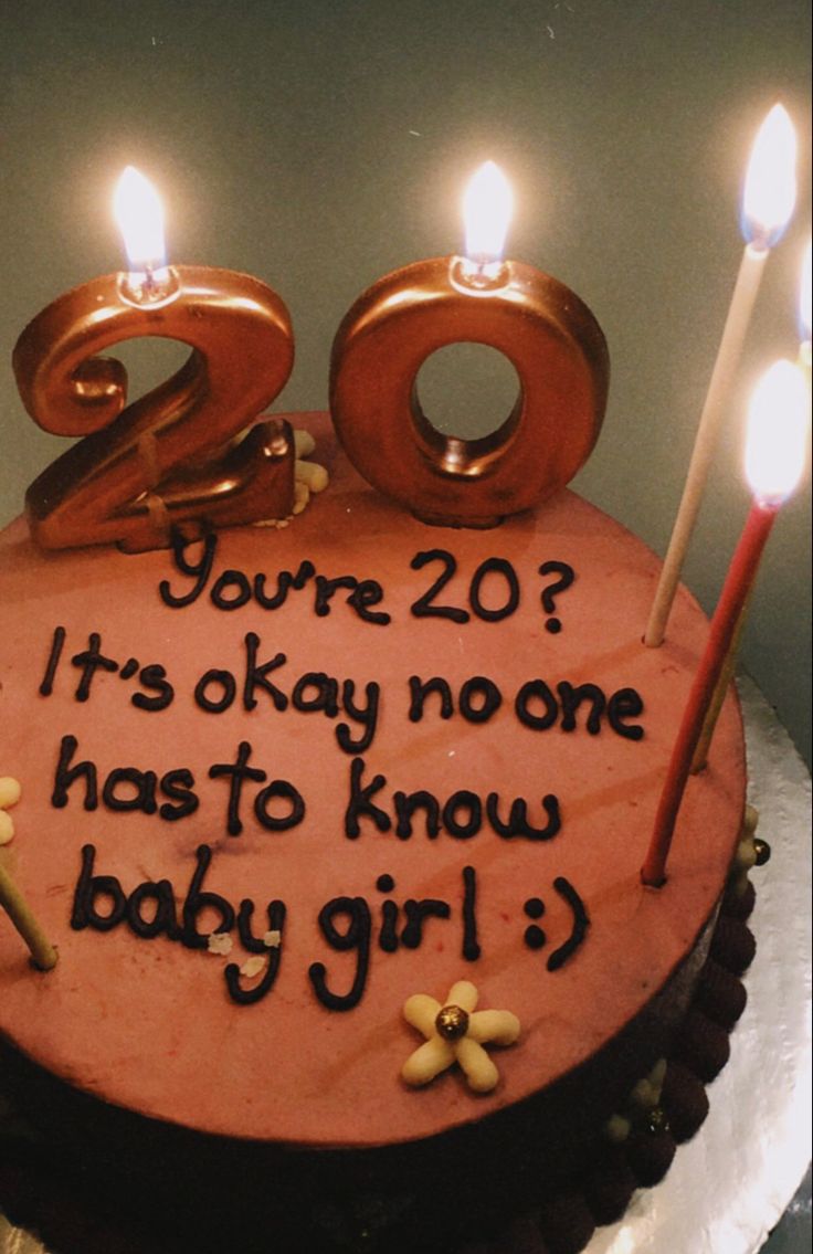 a birthday cake with candles on it that says, you're 20? it's okay no one has to know baby girl