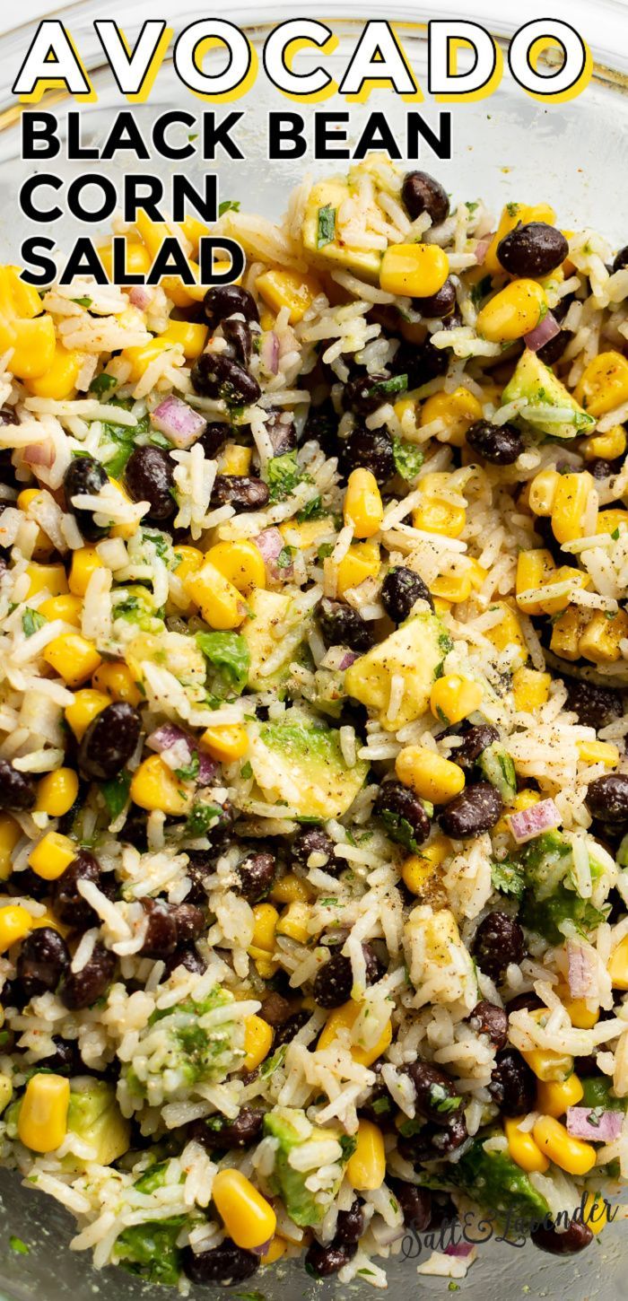 black bean and corn salad in a glass bowl with text overlay that reads, avocado black bean corn salad