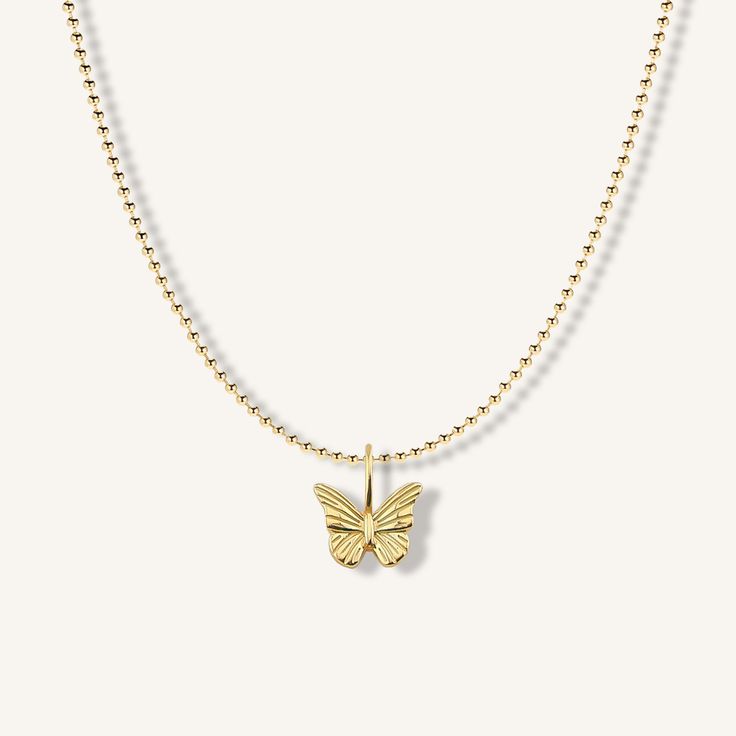 Add some modern romance to your neckline. The Butterfly Necklaces contemporary design with delicate detailing, gets your heart fluttering. Style with your favorite pearls and chains for the ultimate layered look. Created with a sterling silver base and utilizing an extra luxurious 18 karat gold plating for the perfect finish. 16-18" adjustable Removable butterfly pendant 18kt gold plated over stainless steel Elegant Gold-plated Necklace With Butterfly Charm, Elegant Gold Plated Necklace With Butterfly Charm, Elegant 14k Gold Necklace With Butterfly Charm, Elegant Gold Butterfly Necklace With Clavicle Chain, Elegant Yellow Gold Butterfly Necklace With Adjustable Chain, Elegant Gold Necklaces With Butterfly Charm, Elegant Gold Charm Necklace With Butterfly, Elegant Gold Butterfly Pendant Necklace, Dainty Gold-plated Necklace With Butterfly Charm