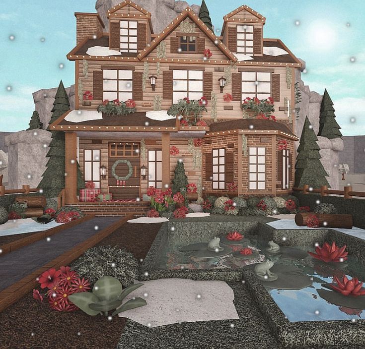 a large house with lots of windows and flowers in the front yard on a snowy day