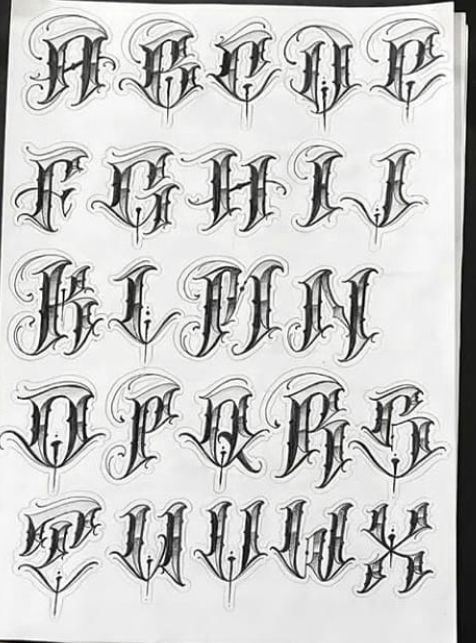 the upper and lower letters are drawn in black ink on white paper, with some type of