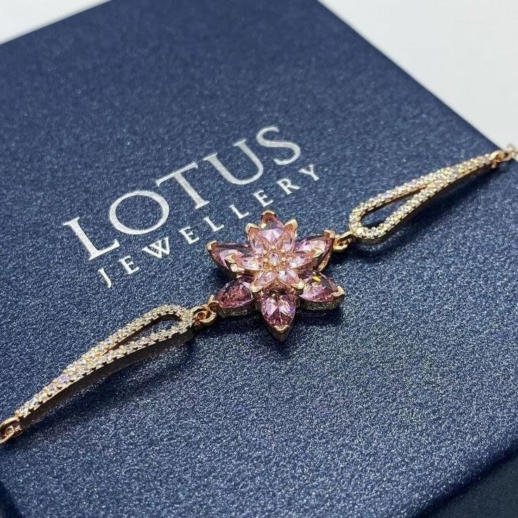 Introducing our stunning Lotus Flower Bracelet, a charming piece of handmade jewelry that exudes elegance and grace. This beautiful lily of the valley flower bracelet features delicate lotus petals in shades of pink, white, and purple, crafted from high-quality sterling silver for a timeless and luxurious feel.  The rose gold bracelet chain adds a touch of modern sophistication, while the lotus flower charm symbolizes purity, enlightenment, and spiritual growth.  A perfect gift for her, this lot Vintage Flower Bracelet, Rose Gold Flower Shaped Bracelets For Wedding, Delicate Flower Shaped Crystal Bracelet As Gift, Dainty Flower Crystal Bracelet Gift, Delicate Flower Shaped Crystal Bracelet Gift, Elegant Flower Decoration Bracelets For Gift, Adjustable Rose Gold Flower-shaped Bracelet, Elegant Crystal Bracelet With Flower Charm, Rose Gold Flower Shaped Bracelets For Gifts