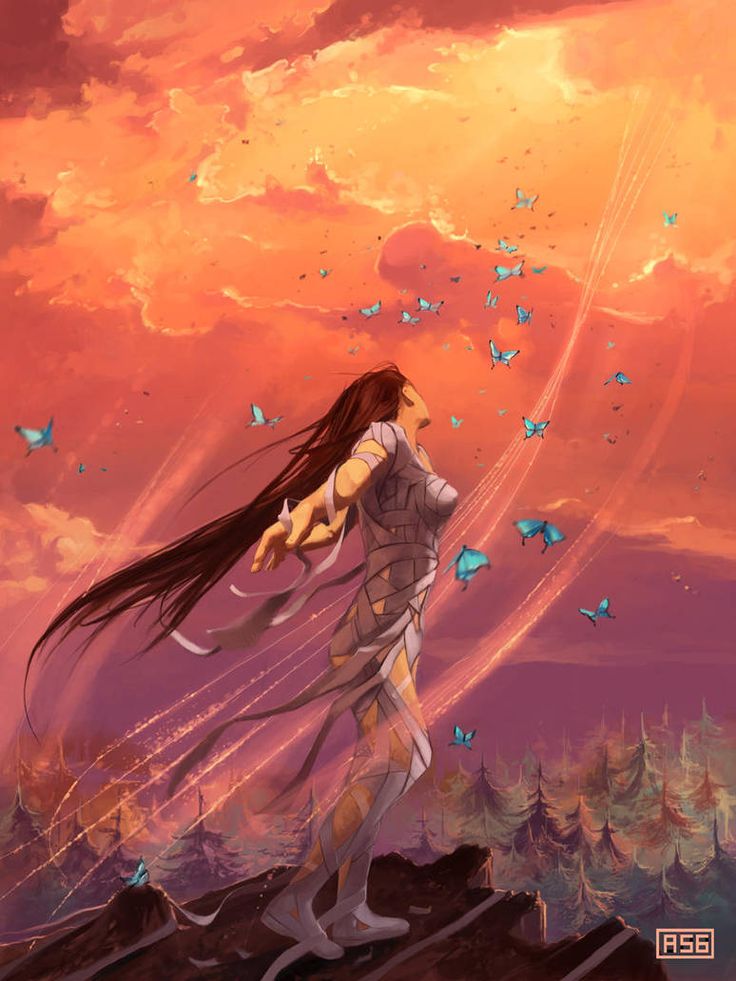 a woman with long hair standing on top of a hill in front of a sunset