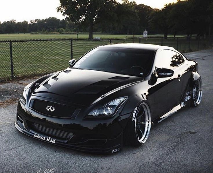 a black sports car parked on the street