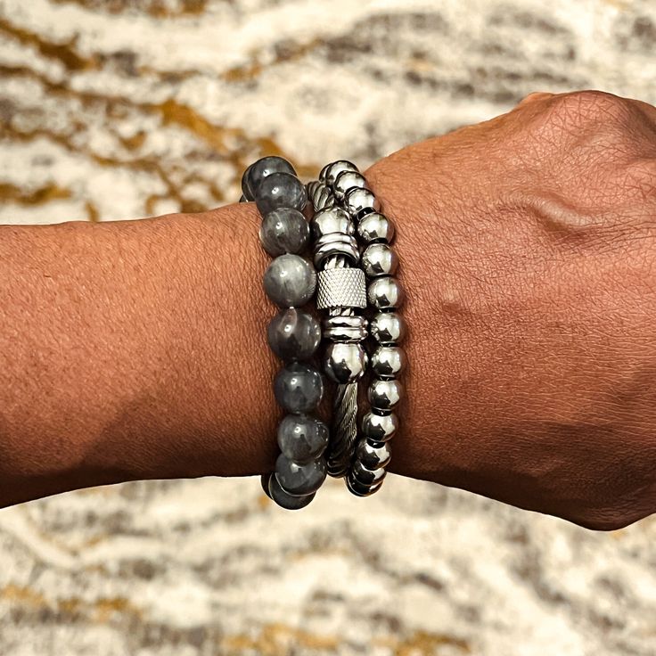 These versatile bracelets are will make a great addition to your jewelry collection. They look great stacked together, worn separately or combined with other bracelets. This bracelet stack includes: - Nakia stainless steel beaded chain bracelet (8mm beads) - Alexis stainless steel bangle - Graciela grey sunstone beaded bracelet This bracelet stack fits wrists up to 7.5 inches Bracelet size guide Everyday Gunmetal Stainless Steel Bracelets, Modern Metal Beaded Bracelets For Everyday Wear, Modern Metal Beaded Bracelets For Everyday, Modern Bracelets With Spacer Beads As A Gift, Stackable Beaded Bracelets With Round Metal Beads, Stackable Metal Beaded Bracelets With Round Beads, Adjustable Gunmetal Bracelet For Everyday, Stackable Metal Beaded Bracelets, Adjustable Gunmetal Stainless Steel Bracelets