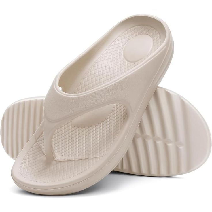 Dive into a realm of comfort and practicality with these Contoured Comfort Flip Flops. They're not just a stylish addition to your summer footwear but also offer a supportive experience with every step. Designed with a focus on comfort and durability, they will be your go-to choice for beach days, backyard barbecues, or simply repose at home. Features: Size: These flip flops come in a range of sizes to ensure a proper fit for various foot dimensions. Material: Made with a durable synthetic mater Slip-resistant Eva Sandals, Non-slip Comfortable Sport Sandals, Comfortable Non-slip Sport Sandals, Comfortable Synthetic Flip Flops With Ortholite Insole, Lightweight Slides With Arch Support And Round Toe, Comfortable Slip-resistant Sport Sandals, Comfortable Flip Flops With Arch Support And Round Toe, Comfortable Arch Support Flip Flops With Round Toe, Comfortable Lightweight Synthetic Sport Sandals