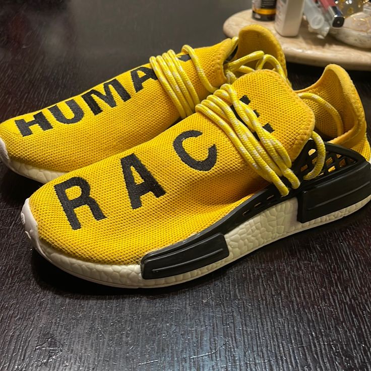 Yellow Race Human Pharrell Williams Mens Sneakers Size 7 Used Still In Good Condition Brand New Price On Goat App Is 2,276 New Price, Shoes Adidas, Pharrell Williams, Adidas Black, Black Adidas, Adidas Shoes, Black N Yellow, Adidas Men, Adidas Sneakers