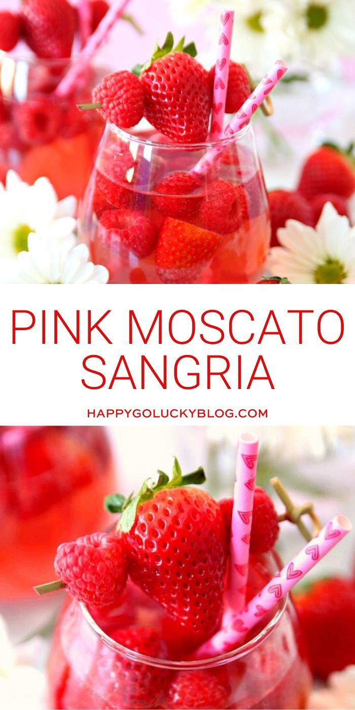 pink moscato sangria with strawberries and flowers in the background