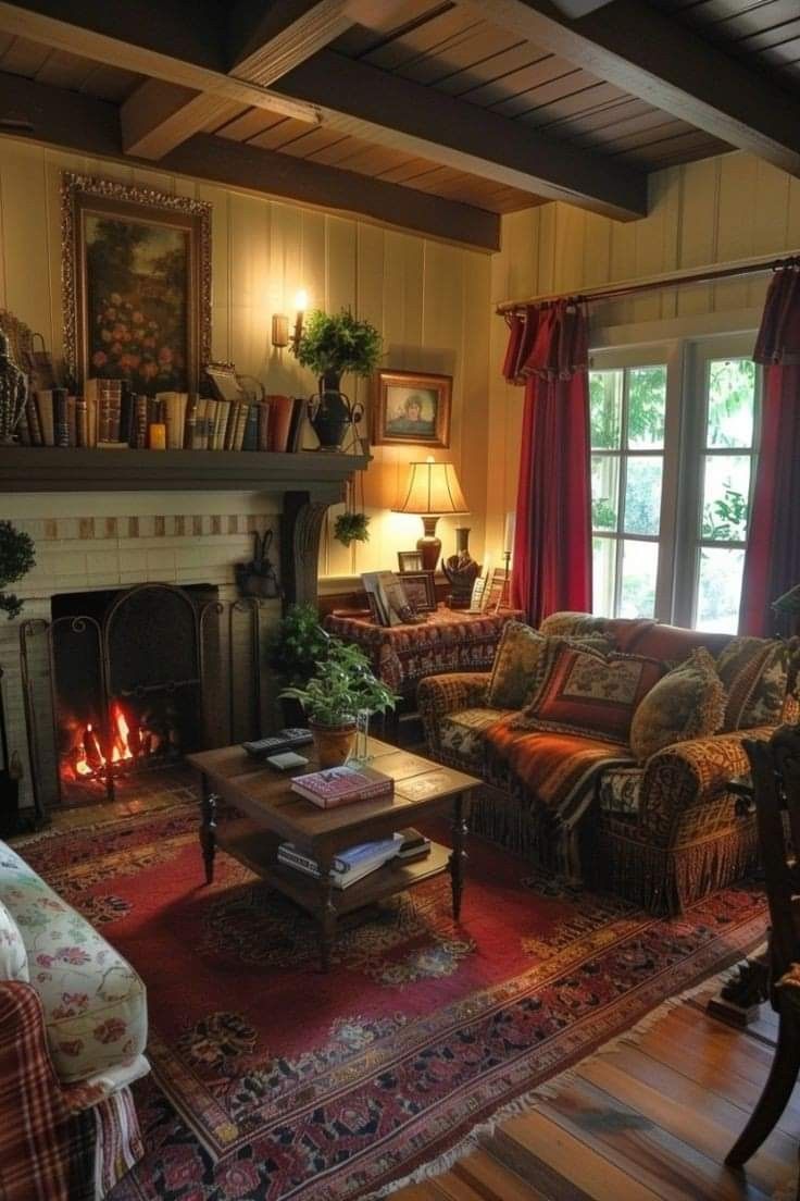 a living room filled with furniture and a fire place in the middle of a room