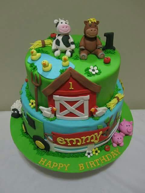 a birthday cake with farm animals on it