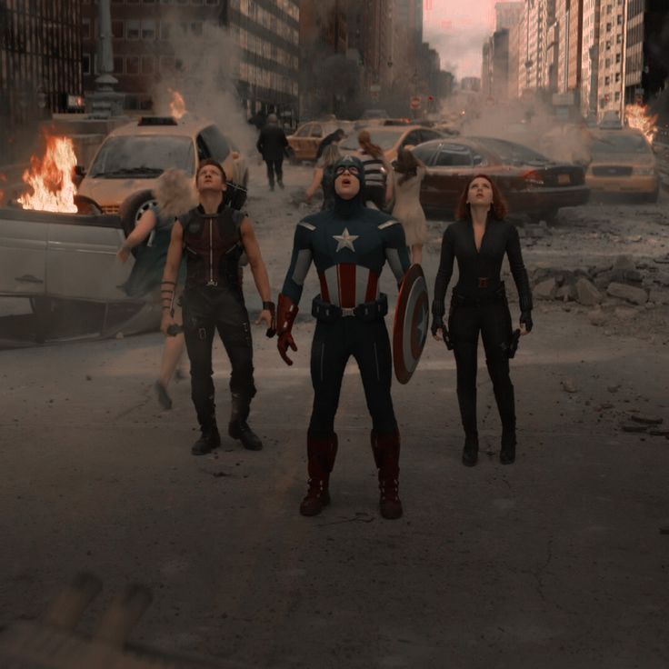 captain america the winter soldier and other avengers characters in a city street with fire coming out of their mouths