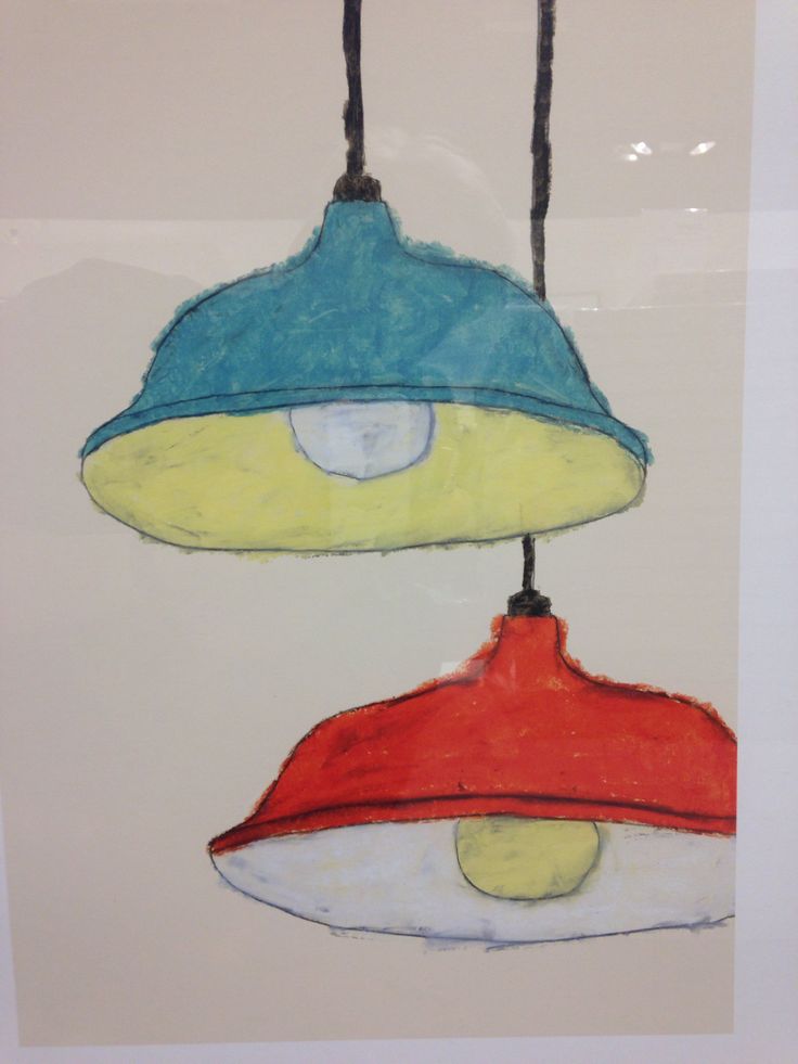 three lamps hanging from strings with one light blue and the other red, on a white background