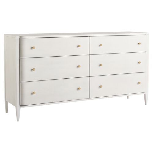 a white dresser with six drawers