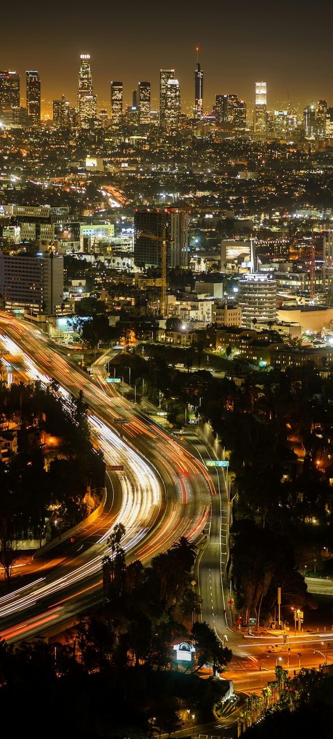 an aerial view of the city lights at night