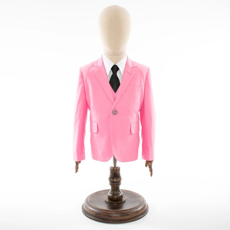 Durable and comfortable, this attractively styled kid's suit is tailored from cotton blend fabric and features a sleek, modern look with notch lapels and a versatile single-breasted design appropriate for weddings or other formal events. 70% Cotton, 30% Polyester Fabric Made For Kids Notch Lapels Single-Breasted Jacket Single-Breasted Vest Spring Pink Single Breasted Suit, Formal Pink Tailored Three-piece Suit, Kids Suits Boys Formal Wear Pink, Tailored Pink Three-piece Suit With Notch Lapel, Single Breasted Jacket, Formal Event, Polyester Fabric, Cotton Blend, Fashion Tips