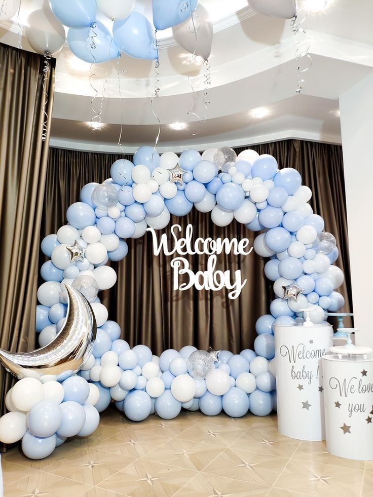 a welcome baby sign made out of balloons