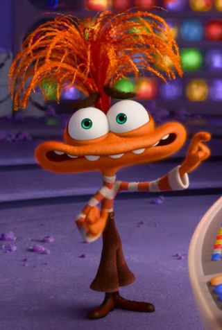 a cartoon character with an orange hair and green eyes pointing to something in front of him