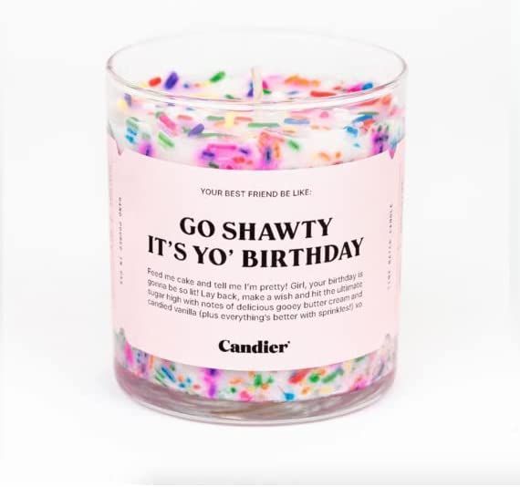 a glass jar filled with colorful sprinkles and the words go shawty it's yo birthday