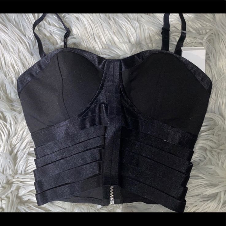 Size Small Black New From Charlotte Russe New W/ Tags Fierce Sculpting Sexy Crop Top Caged Bustier Bandage Bottom Part Padded Bra Part For Lift Metal Zipper On Back Part Straps Are Adjustable Style 2t11527-R2x 88%Polyester 8%Rayon 4% Spandex Strappy Party Top With Built-in Bra, Chic Crop Top With Adjustable Straps And Underwire, Fitted Spaghetti Strap Bra For Night Out, Edgy Party Tops With Built-in Bra, Party Corset With Spaghetti Straps And Bra Friendly, Spaghetti Strap Party Corset With Bra Friendly Design, Cropped Strap Tank Top For Party, Cropped Party Tank Top With Straps, Fitted Crop Top Bra With Removable Pads