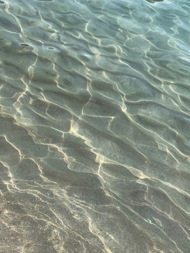 the water is so clear that it appears to be crystal blue and has ripples