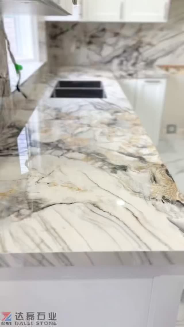 a marble counter top in a kitchen