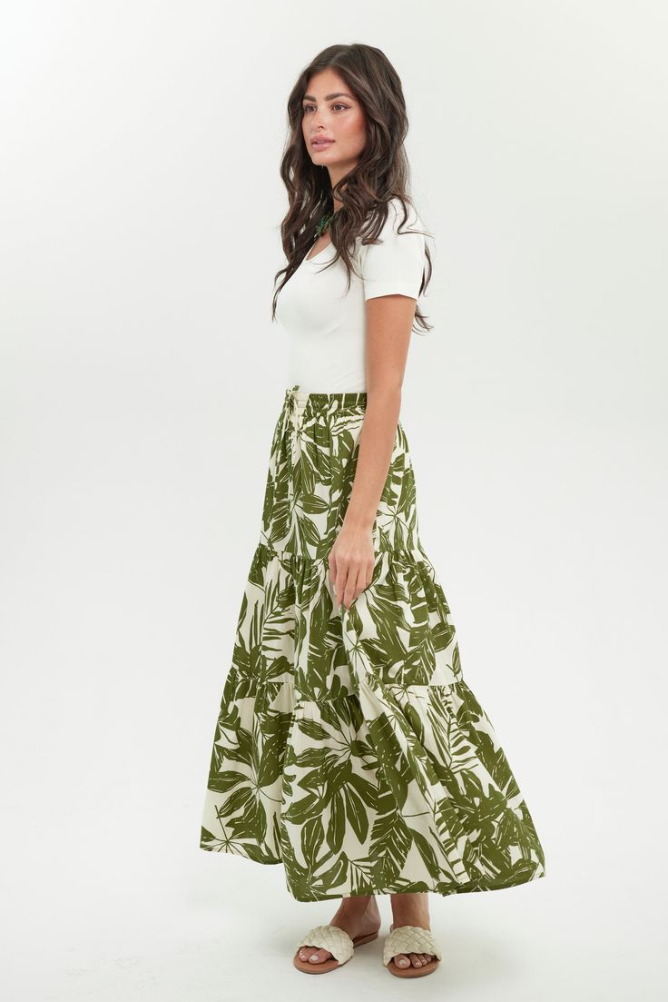 Are you looking for an easy, comfortable skirt? With tiered layers for movement and a flattering a-line cut, our Resort Skirt is your slip-on-and-go style for year-round wear. Style it for all seasons -- pairing it with a linen top in summer or adding a boot and a light jacket layer - you'll have a fall look. Maxi length Pockets Elastic waistband with drawstring tie Material: 100% Indian Cotton Care: Machine wash, hang to dry, or tumble dry low Studio model is 5'8" and is wearing a Small Summer Flowy Tiered Maxi Skirt, Flowy Tiered Maxi Skirt For Summer, Casual Tiered Maxi Skirt With Gathered Detail, Casual Tiered Maxi Skirt For Brunch, Tiered Bottoms With Layered Hem, Casual Voluminous Maxi Skirt For Vacation, Voluminous Gathered Skirt For Vacation, Voluminous Tiered Skirt For Beach, Casual Vacation Maxi Skirt With Gathered Detail