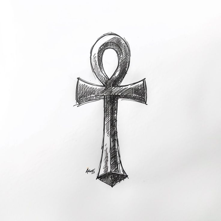 an egyptian cross drawn in pencil on a white paper