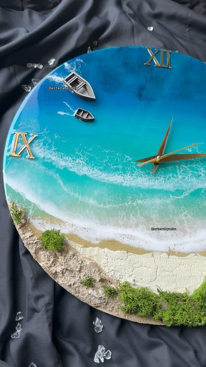 a clock made to look like the beach with boats on it