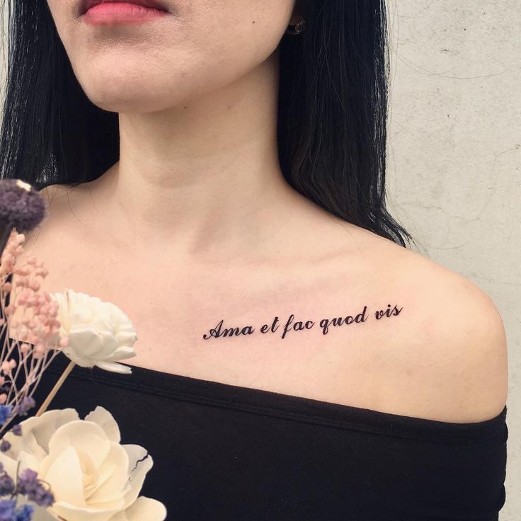 a woman with a tattoo on her shoulder that reads, smell i have given us