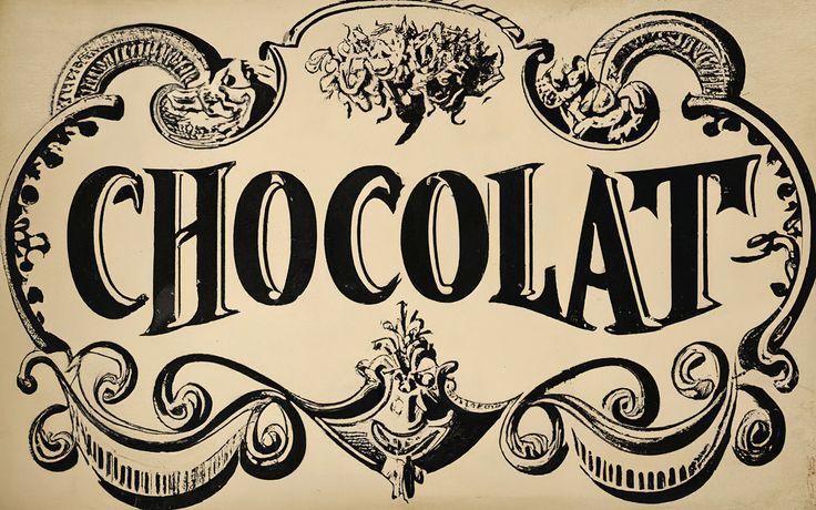 an old fashioned sign with the word chocolate on it