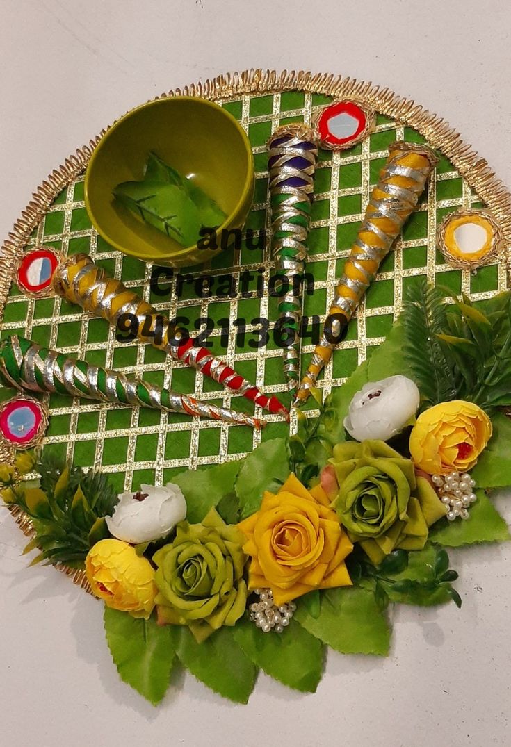 a basket with flowers and other items on it